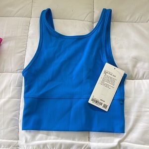 Lululemon power pivot tank size 4, brand new with tags.